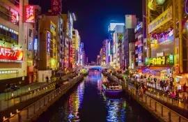 Dotonbori is one of the principal tourist destinations in Osaka, running along the canal in Namba.